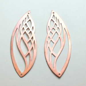 Handcrafted copper emblems